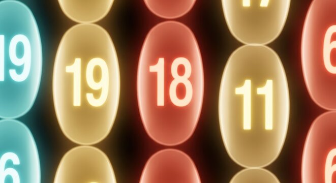 Close-up view of glowing oval shapes with numbers inside, suggesting a game or abstract concept.