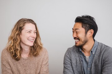 Obraz premium Business Collaboration Between Caucasian Woman and Asian Man Office Setting Editorial Image Positive Environment Engaging Viewpoint
