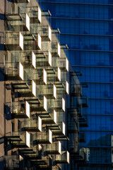 Glass balconies in multi-family buildings, apartment density, real estate, and housing market.