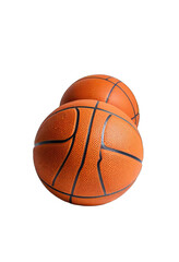 Two orange basketballs against black background