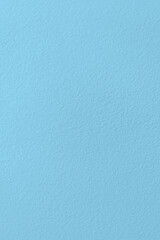 Soft sky blue painted cement wall texture, perfect for calm and clean background design