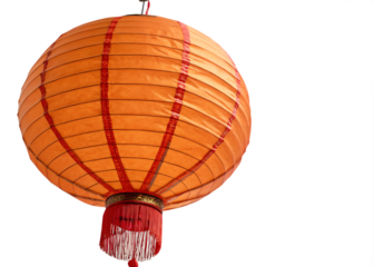 Orange paper lantern with red border and fringe isolated on a transparent background