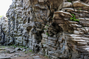 The photo shows a stone wall with perfectly laid layers