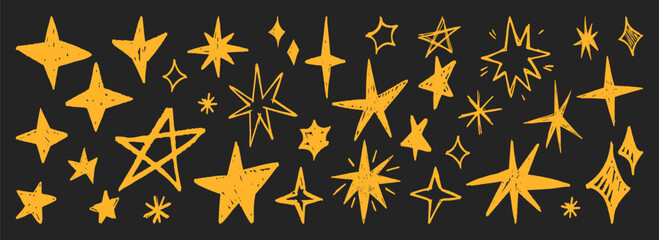 Golden star shapes with grunge texture and crayon spark elements on dark background for decorative design. Hand drawn celestial symbols with rough edges and various shapes for holiday projects.