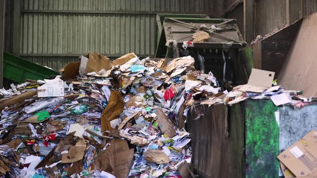 A waste sorting facility, also known as a Materials Recovery Facility (MRF) or recycling center, is a specialized plant that receives and separates mixed waste to isolate recyclable materials.