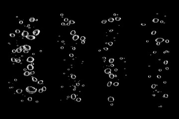 Realistic water bubbles isolated on black background, perfect for creative design, advertising, beverage branding, and underwater concepts. High-resolution transparent effect.