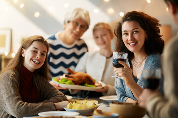 Family celebrating Thanksgiving Day