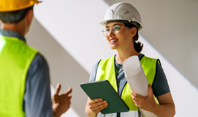 Team of architects working on plans