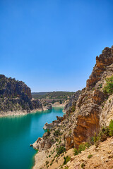 View from above of a reservoir with turquoise water