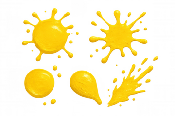 Yellow paint splashes and drops set on transparent background, symbolizing creativity, art, and expressive design