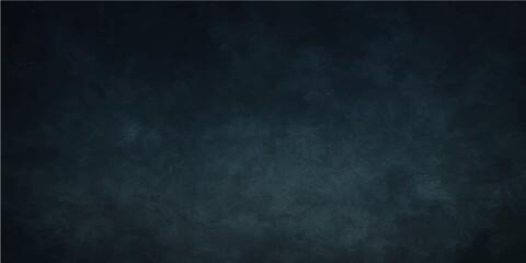 Grunge texture on an empty, dark blue chalkboard, perfect for vintage design or a blank backdrop