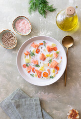 Finnish fish soup lohikeitto with salmon and vegetables. National cuisine. Healthy eating.