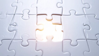 White jigsaw puzzle with one missing piece revealing vibrant mountain landscape, symbolizing discovery and hidden beauty.