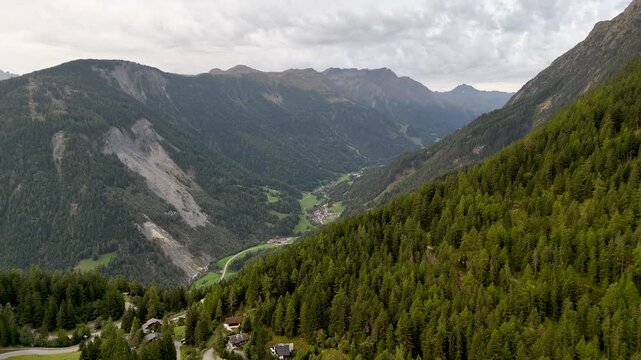 4K High resolution aerial drone video of the beautiful town of Champex Lac Switzerland one of the gems that the TMB- Tour du Mont Blanc goes through with small houses and a beautiful lake