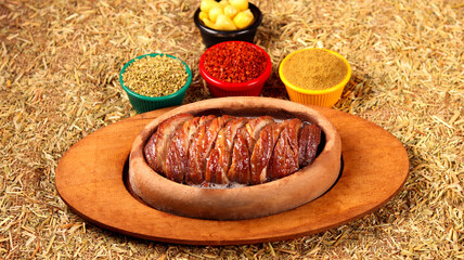 a beautiful picture of kokorech served with vegetables and spices,close up view