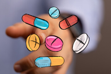 Image of hand interacting with colorful drawn pills and capsules.  Perfect for healthcare, medicine, pharmacy concepts.