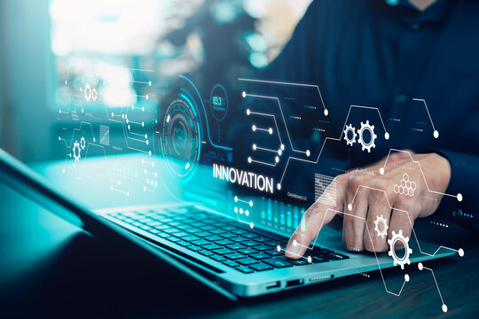 Innovation with Graphical User Interface Concept, businessman pointing on a virtual panoramic screen. Innovative ideas presented by management consultants on-screen, design, invention development