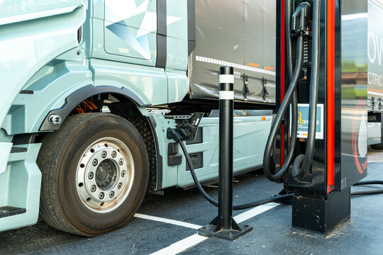 Electric truck at charging point highlights emission free logistics clean freight mobility and sustainable infrastructure for modern transport. Spain, Europe &ndash; August 8, 2025