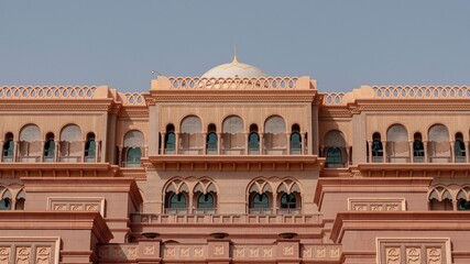 Exterior facade of Emirates Palace with Arabic architecture, Abu Dhabi