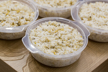 Barley mixed grain rice in a plastic container