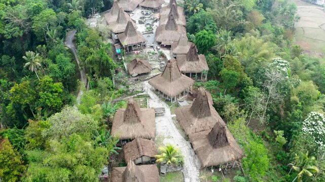 Aerial drone footage of traditional huts at Praijing village, Sumba island, Indonesia