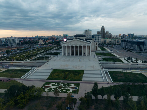 Aerial view of the Astana Opera House, a neoclassical building with tall white columns, standing majestically against the skyline, Astana, Astana, Kazakhstan.