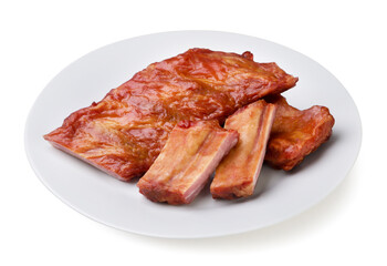Fried pork ribs in a plate close-up on a white. Isolated