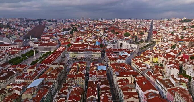  Aerial view on old center Alfama, district of Lisbon with Saint Stephen Church. Lisbon, Portugal
