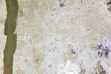 Concrete surface showing wear and texture in a construction area