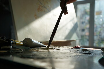 Painting on Canvas in Studio