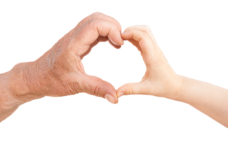 Hands of a child and an elderly person forming a heart symbol. Concept of love, care, family, and unity across generations.
