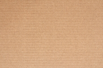Cardboard sheet texture background, detail of recycle brown paper box pattern.