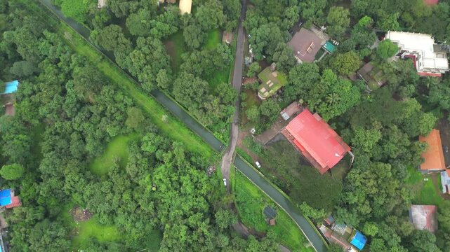 small village road cross to dam water river lonavala bhushi dam