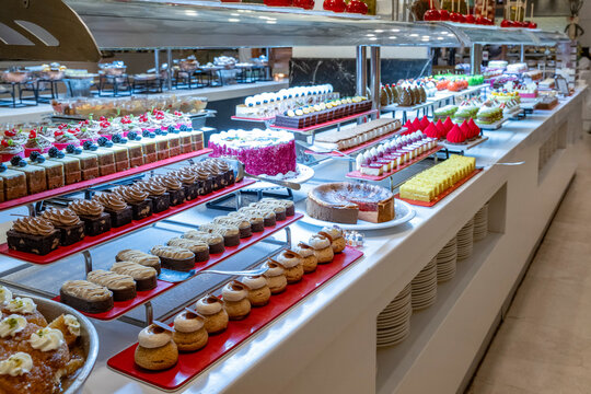 Karisik Turk tatlilari. New dessert varieties at the luxury hotel open buffet. Milk-based desserts, Turkish Dessert Sobiyet, havuc dilimi, midye baklava, mussels baklava and classic baklava.