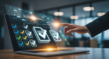 A hand interacts with a futuristic holographic interface on a laptop, highlighting innovation and digital transformation