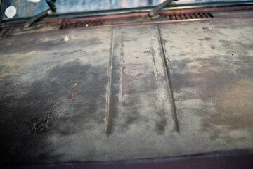 Close up of faded paintwork car bonnet