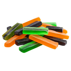 a pile of green, orange, and black gummy, rectangular-shaped candy sticks isolated on a white background 