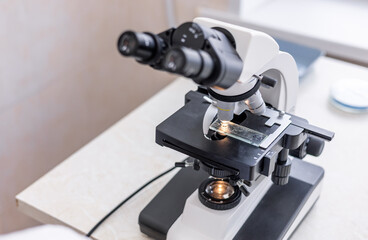Focus on scope equipment and tools. Magnifying appliance in medical lab making and conducting experiments. Precision in results and researches. Medicine and healthcare concept