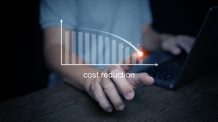 Business cost reduction concept with finger pointing at graph, showing downward bar chart trend, symbolizing financial savings, budget control, expense optimization, efficiency strategy.