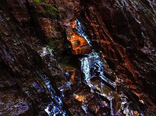 Autumn trend Burnt Wood. Burnt Wood color. Autumn style. Rock texture. Geodesy and geology. Burnt Wood tinted minerals.