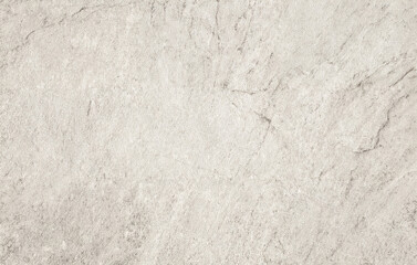 Neutral gray stone texture with natural surface details and subtle marble-like patterns.