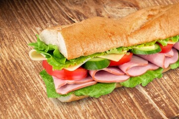 Tasty fresh sandwich with crusty bread and vegetables