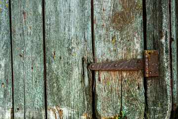 Fragment of an old wooden door with wood texture.
