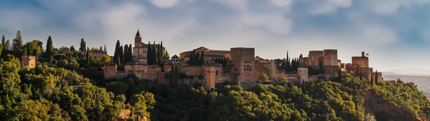 Panoramic photo of the Alhambra under a sky with mammatus clouds