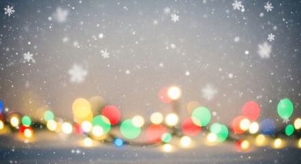Blurred christmas lights with falling snow creating a festive winter background for holiday designs and seasonal greetings with copy space