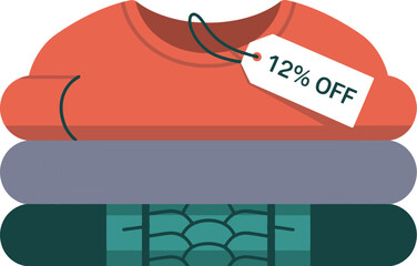 Stack of folded clothes with a sale tag attached