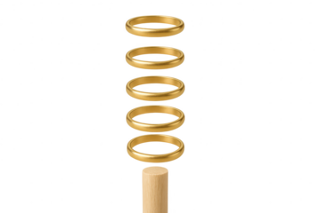 Vertical stack of golden rings on wooden base, isolated on transparent background