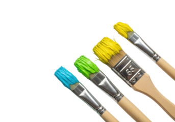 Three paintbrushes with turquoise, lime, yellow paint on a white canvas, with copy space and blurred abstract teal, emerald, gold background. Concept of vibrant artistic creativity