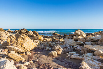  Evening Cyprus Seashore with Rocks on Sandy Beach and Sunset Horizon