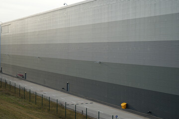 Long metal industrial building exterior near East Midlands Airport Trail, Nottinghamshire, England